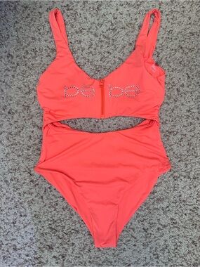 bebe Coral-One Piece Seamless bottom with Front Zip and Rhinestone Detail